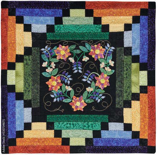 Patchwork style pillowcase with applique in the center