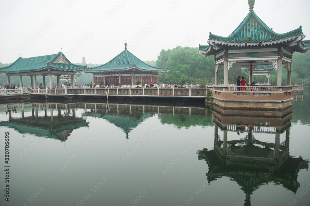 Fototapeta premium Wuhan, China - April 24, 2019: Ting Tao Scenic Area in Wuhan East Lake Sakura Garden,Wuhan,China.