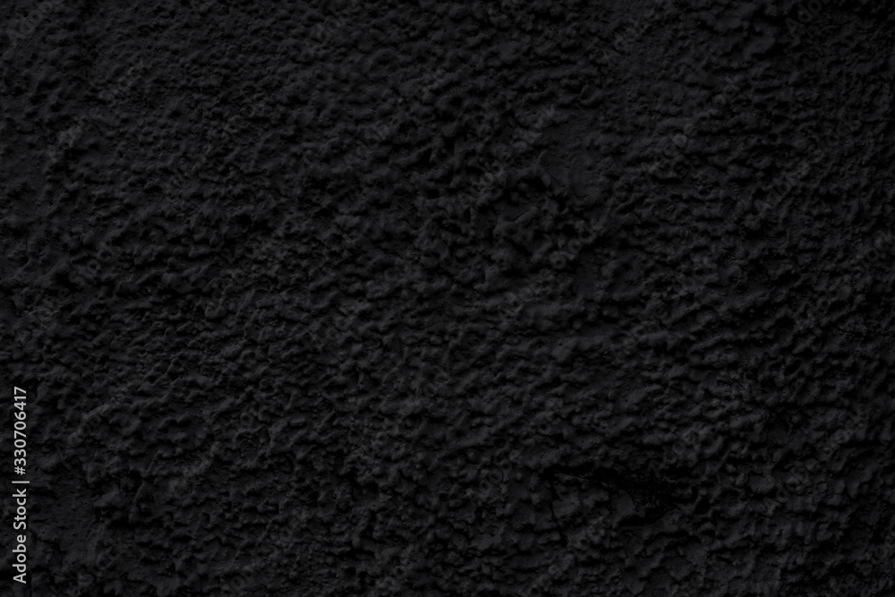 Abstract black background. Black stucco texture. Dark rough surface. Abstract black background. Black stucco texture. Dark rough surface.