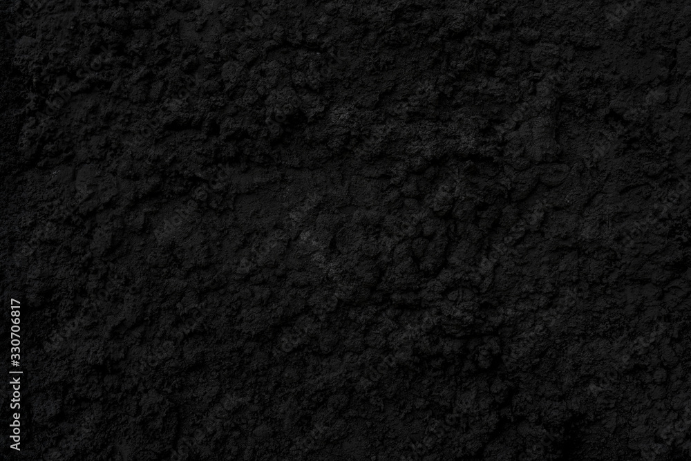 Abstract black background. Black stucco texture. Dark rough surface. Abstract black background. Black stucco texture. Dark rough surface.