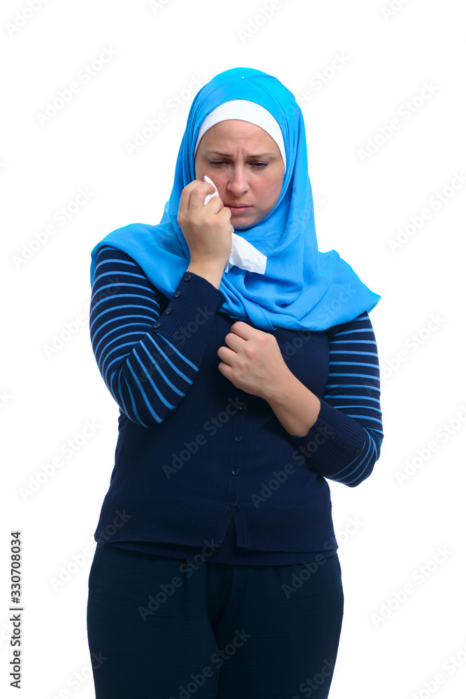 Sad stressed arab woman mourning crying alone isolated on white background Sad stressed arab woman mourning crying alone isolated on white background