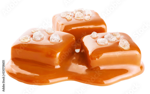 Salted caramel pieces isolated on white background.