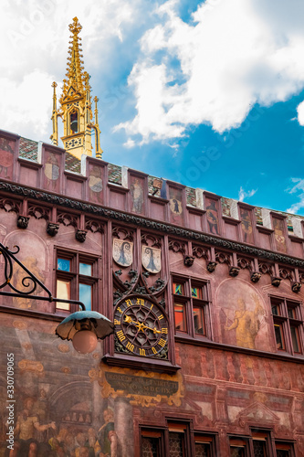 Принти на полотні Nice close-up view of the wall with the clock and the golden turret in the inner courtyard of the Town Hall in Basel