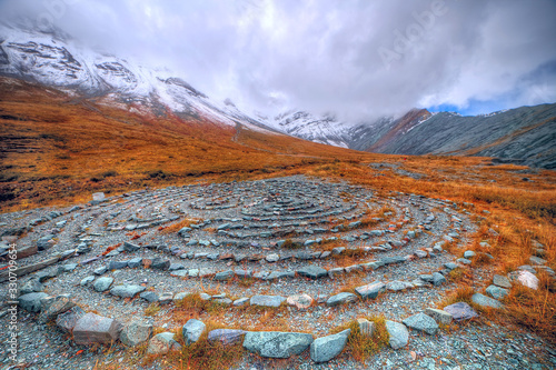 A magical place in the mountains. Ancient mazes of stones. Mountain landscape.