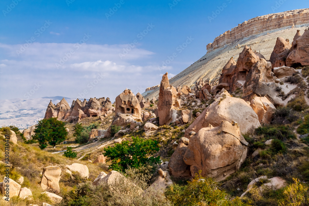 Fototapeta premium Picturesque panoramic landscape view on Goreme national park. View of Zelve open air museum, Cappadocia, Turkey