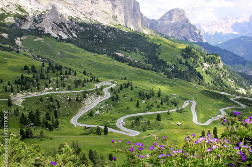 Curvy motor way at the Gardena Pass, Dolomites Alps, South Tyrol, Italy