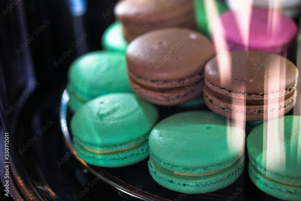 Delicious sweets in a shop window. Beautiful cookies for sale. Stock background Delicious sweets in a shop window. Beautiful cookies for sale. Stock background
