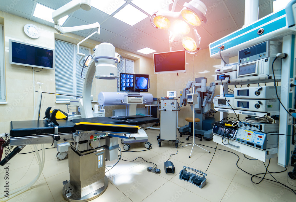 Equipment and medical devices in modern operating room. Operating theatre. Selective focus.
