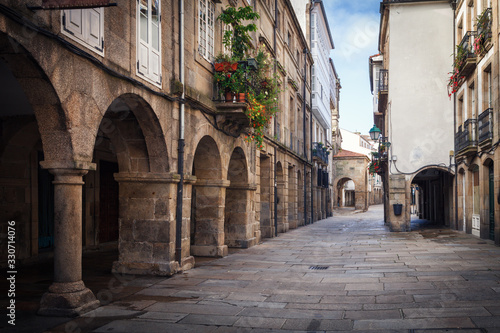 Pedestrian street and historic building facades in old town Santiago de Compostela  Spain.