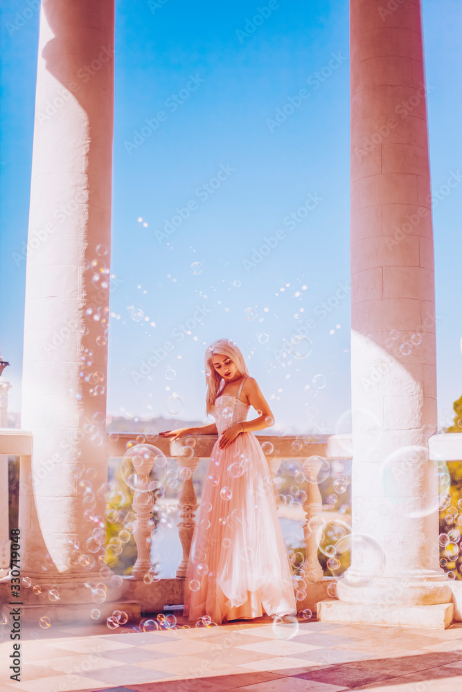 Beautiful woman with bubbles in park Beautiful woman with bubbles in park