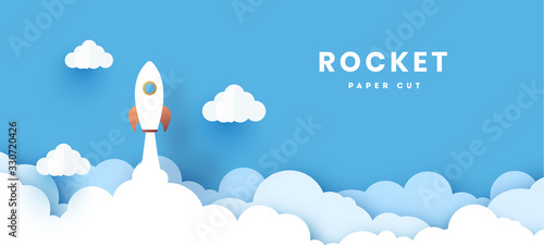 Start up business concept. rocket flying on the air,paper art and digital craft style. With shine and