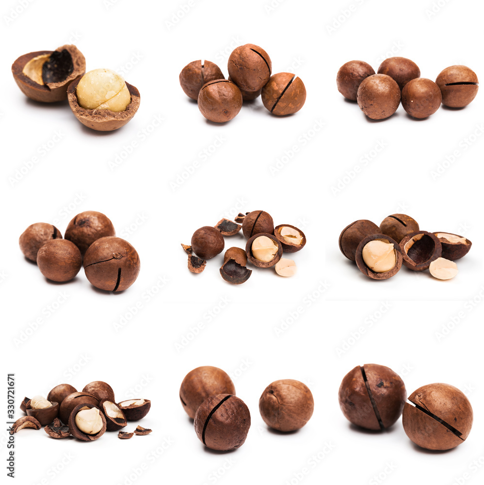 Fototapeta premium Macadamia nut with pieces and green leaves isolated on a white background