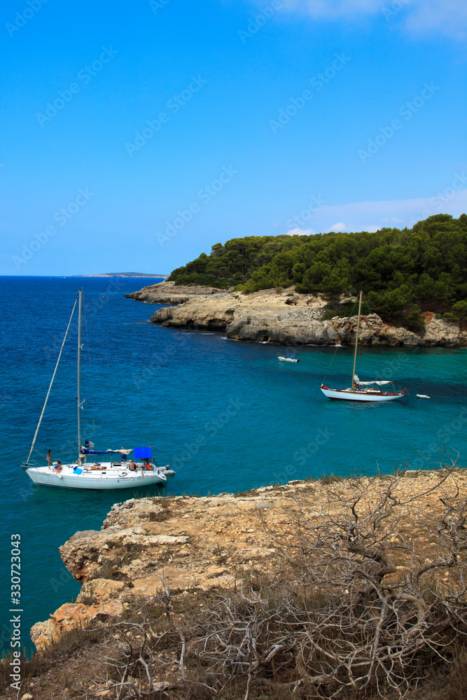 Es Migjorn Gran, Menorca / Spain - June 25, 2016: The Escorxada bay, Es Migjorn Gran, Menorca, Balearic Islands, Spain