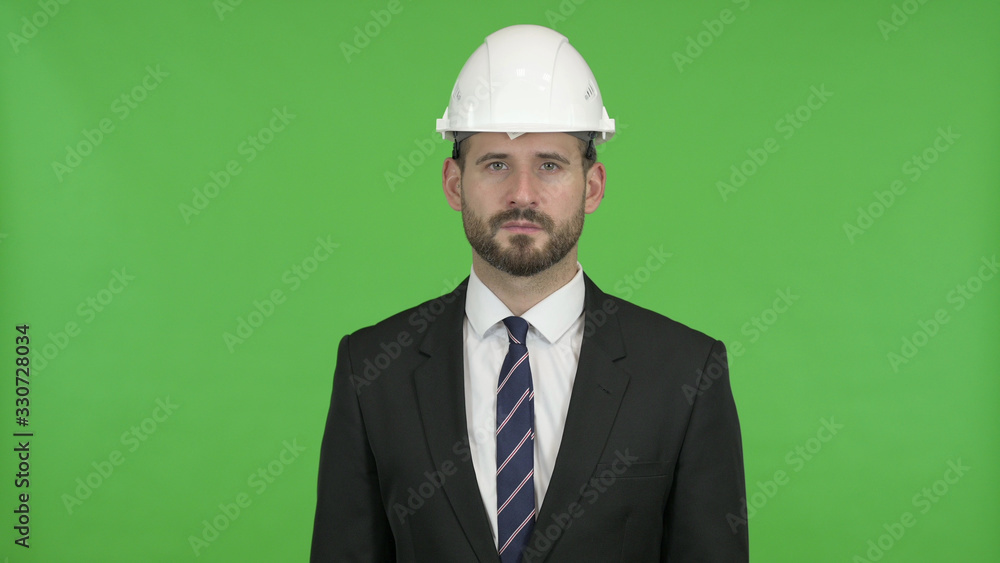 The Ambitious Engineer looking in Camera against Chroma Key The Ambitious Engineer looking in Camera against Chroma Key