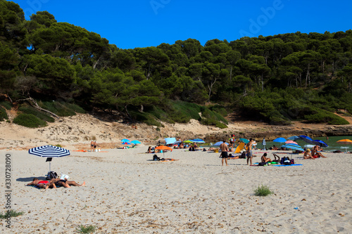 Cala Trebaluger, Menorca / Spain - June 22, 2016: Cala Trebaluger beach and bay, Migjorn Gran, Menorca, Balearic Islands, Spain photo