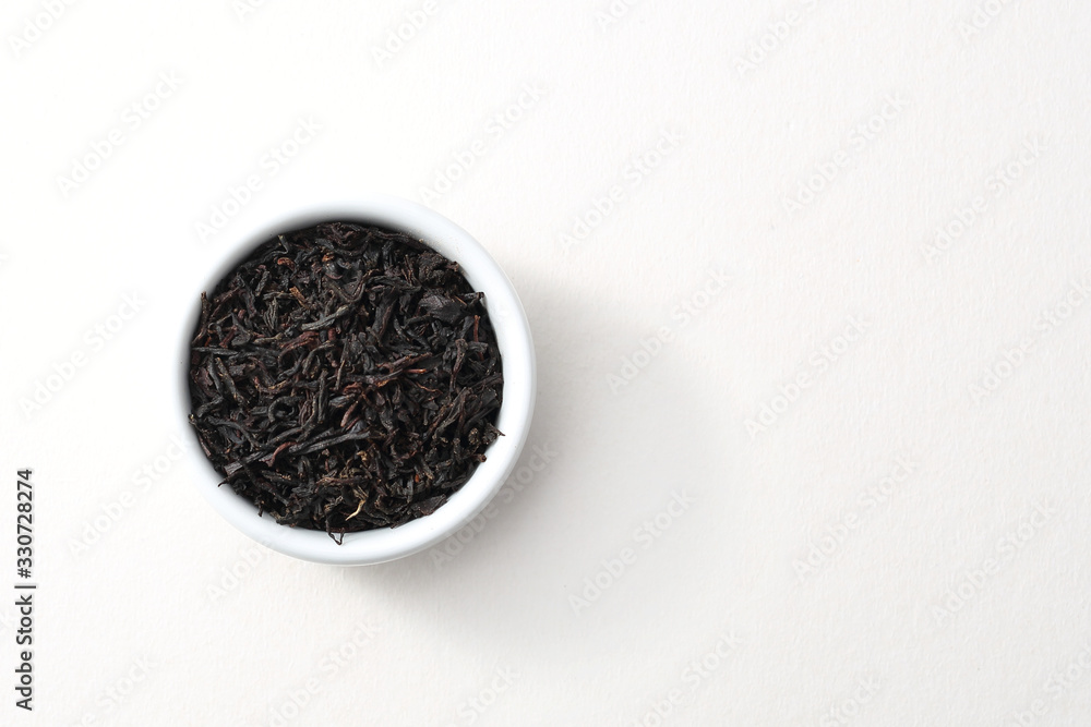 Ceylon black tea. Top view, white background, isolated. Black tea on white background, isolated top view. Ceylon black tea. Top view, white background, isolated. Black tea on white background, isolated top view.