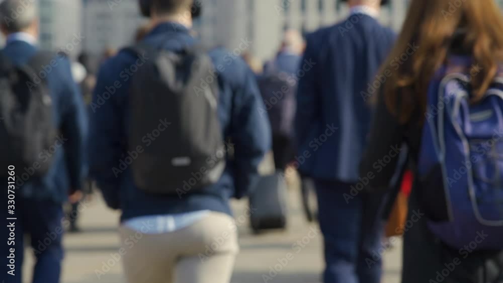 Crowd of pedestrian commuters in London on cool morning in slow motion. Clip 60b Crowd of pedestrian commuters in London on cool morning in slow motion. Clip 60b