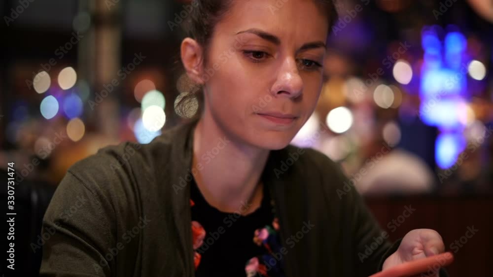 Woman making gross face while dining in a restaurant leaving the food after Woman making gross face while dining in a restaurant leaving the food after