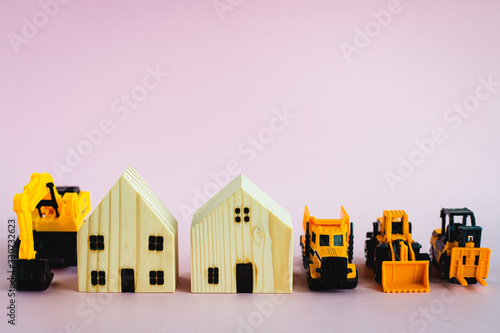 A yellow toy heavy machiner...