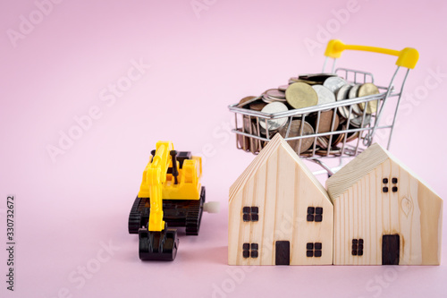 Wooden houses with excavato...