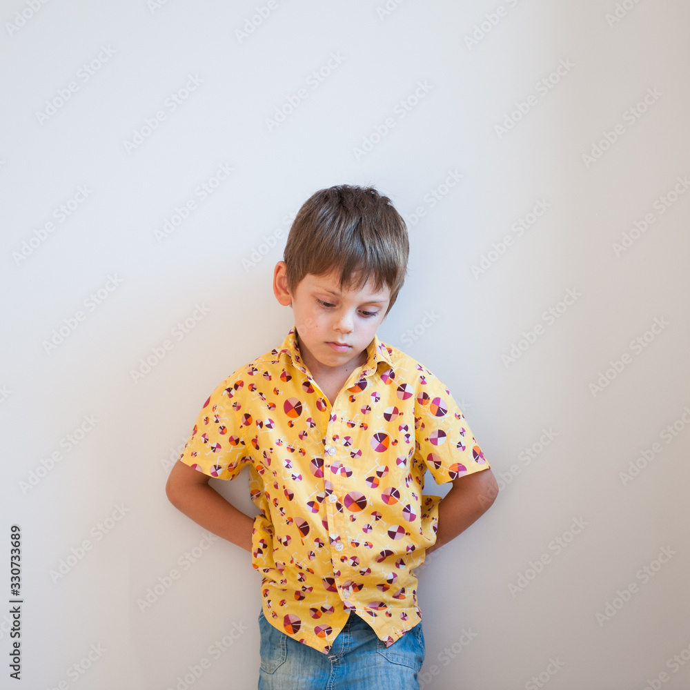 stress mind state concept on upset little sad kid in shirt head down leaning wall stress mind state concept on upset little sad kid in shirt head down leaning wall