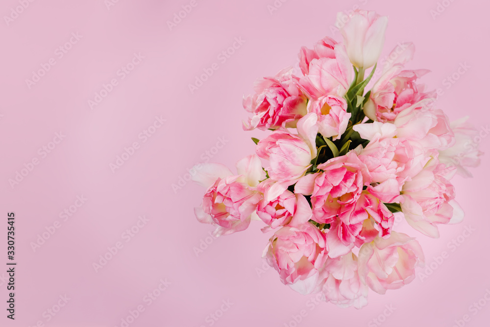 Creative spring background composition colorful flowers on pink background. Minimal top down summer concept. Copy space. Card template