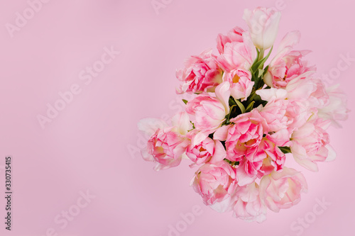 Fototapeta Naklejka Na Ścianę i Meble -  Creative spring background composition colorful flowers on pink background. Minimal top down summer concept. Copy space. Card template