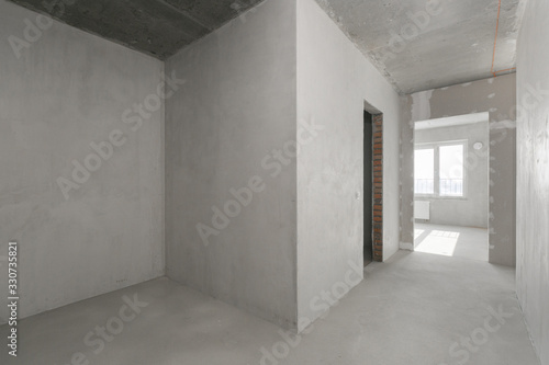 interior of the apartment without decoration in gray colors