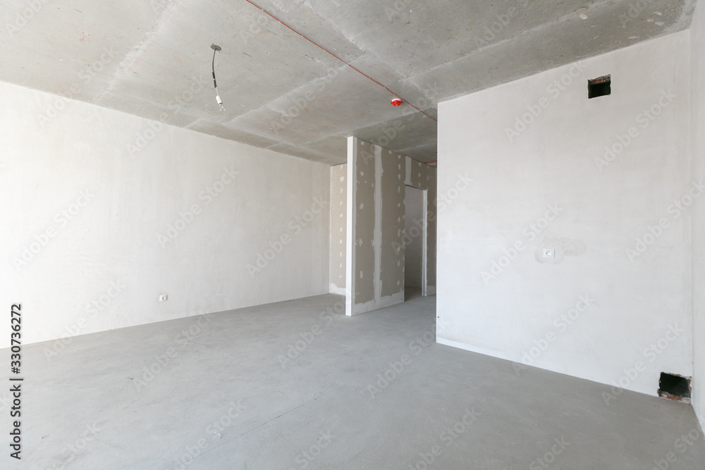 interior of the apartment without decoration in gray colors interior of the apartment without decoration in gray colors