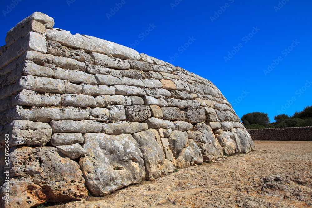 Ciutadela, Menorca / Spain - June 25, 2016: The Naveta des Tudons Talaiot culture prehistoric burial site, Ciutadela, Menorca, Balearic Islands, Spain