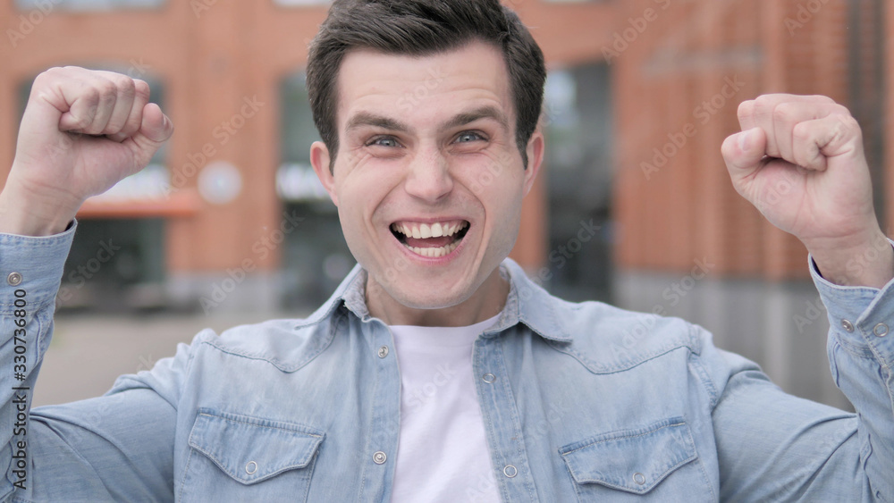 Young Man Celebrating Success Outdoor Young Man Celebrating Success Outdoor
