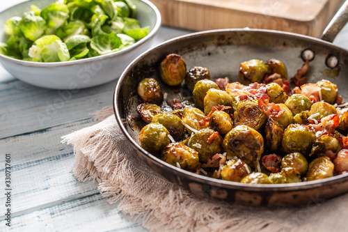 Fried brussels sprout with roasted bacon and parmesan cheese
