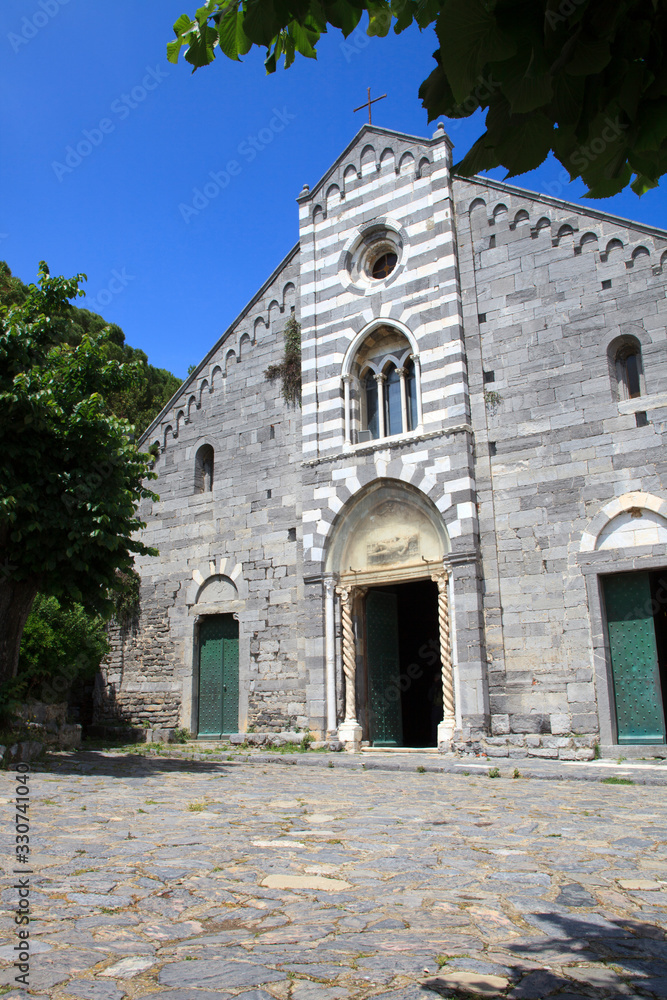 Portovenere ( SP ), Italy - April 15, 2017: Church of San Lorenzo, Portovenere, gulf of Poets, Cinque Terre, La Spezia, Liguria, Italy