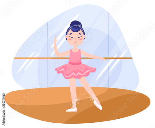 Beautiful little balerina girl performing in the dance class.
