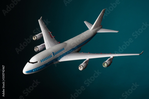 Plane against the dark sky....