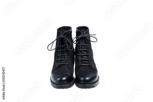 Pair of black ladies shoes, on a white background © Georgi