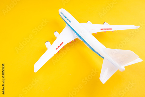 Plane on a yellow backgroun...