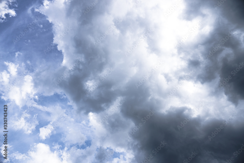Terrible thunderclouds from the side of a plane. Gloomy epic clouds. Background image in a dark gray style. Terrible thunderclouds from the side of a plane. Gloomy epic clouds. Background image in a dark gray style.