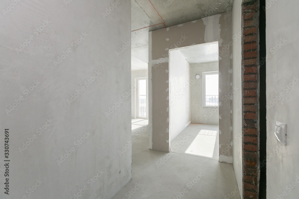 interior of the apartment without decoration in gray colors interior of the apartment without decoration in gray colors
