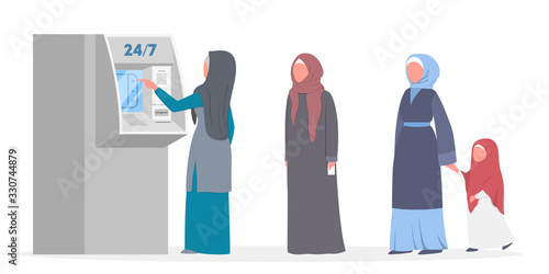 Queue to ATM. Muslim people standing in queue to ATM.