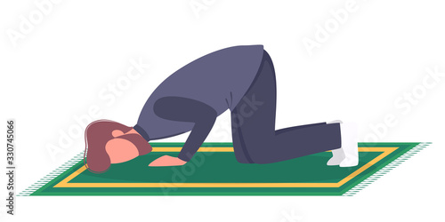 Muslim man praying position. Man in traditinal clothes