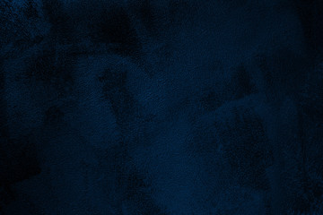 Elegant navy blue colored dark Concrete textured cool grunge abstract background with roughness and irregularities. 2020 color trend concept.
