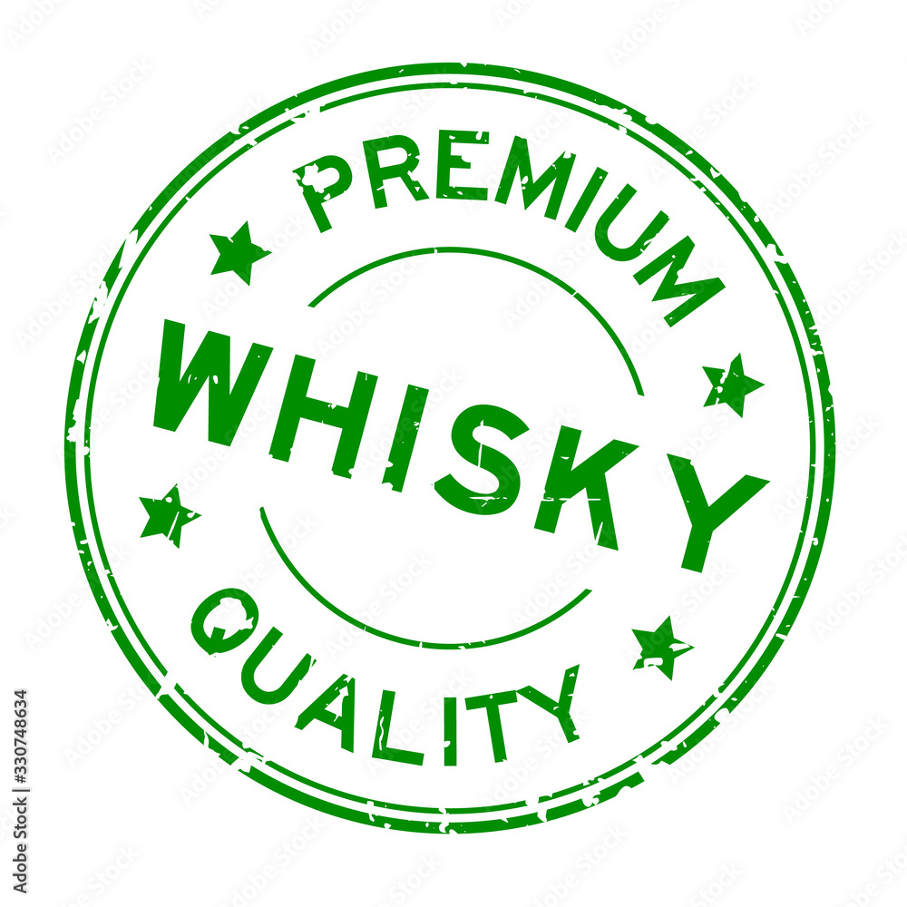 Grunge green premium quality whisky word round rubber seal stamp on white background