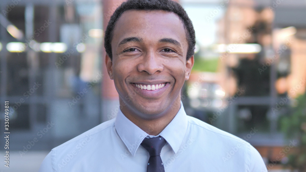 Outdoor Portrait of Smiling African Businessman Outdoor Portrait of Smiling African Businessman