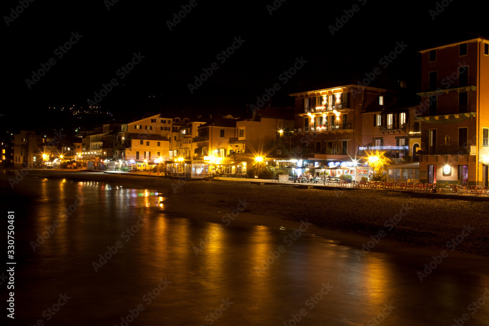 Alassio (SV), Italy - February 15, 2017: Alassio town at night, Riviera dei Fiori, Savona, Liguria, Italy.