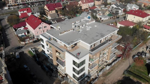 Building crane and building under construction. Construction site.