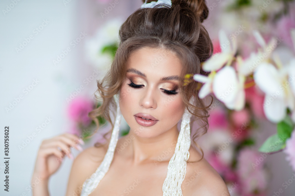 young bride in floral wedding decor