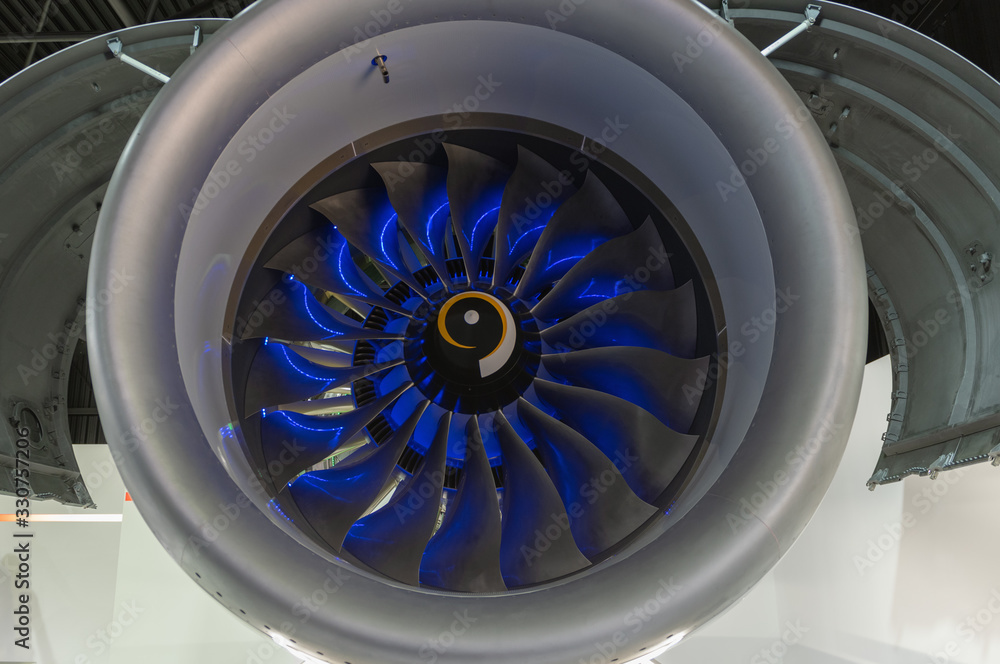 Fan of a civil turbofan aircraft engine in the exhibition hall.