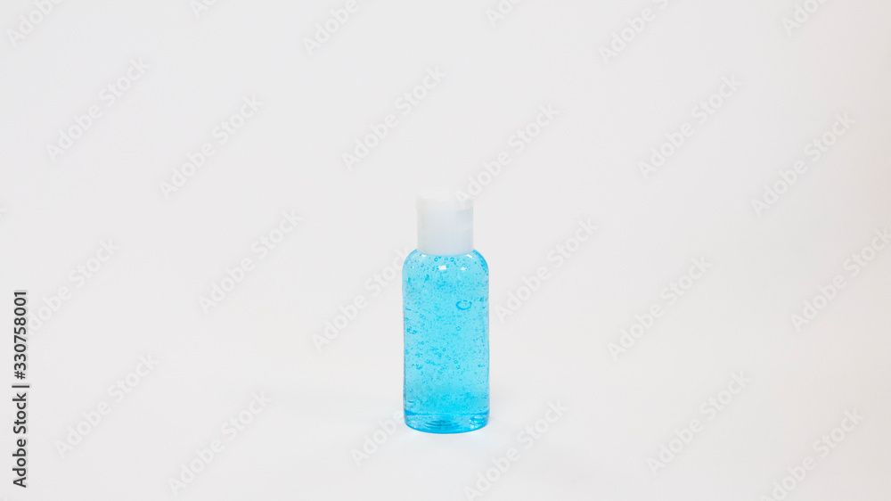 Clear hand sanitizer in a clear pump bottle isolated on a white background. Hand sanitizer is used for killing germs, bacteria and viruses, some of which can cause H1N1 flu or swine flu. Covid-19 Clear hand sanitizer in a clear pump bottle isolated on a white background. Hand sanitizer is used for killing germs, bacteria and viruses, some of which can cause H1N1 flu or swine flu. Covid-19