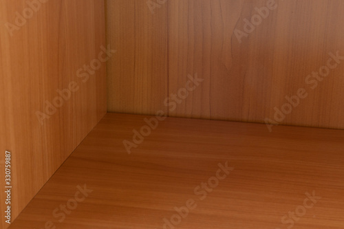 wooden shelf in wardrobe geometry lines and angles shapes wood material textured surface furniture background object